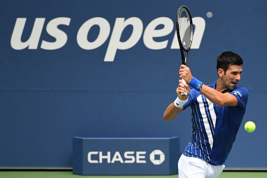 Djokovic overcomes slow start to extend win streak